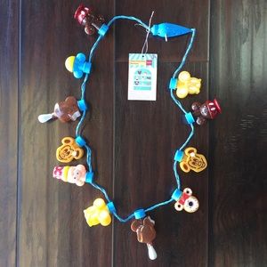 Disney Parks Food Light Up Glow Necklace.